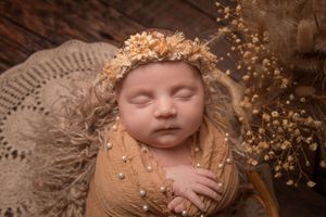 rustic newborn session boho styling handmade tieback and pearl wrap