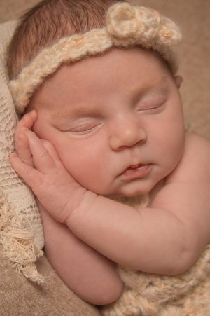 boho newborn detail shot baby girl neutral colours handmade outfit
