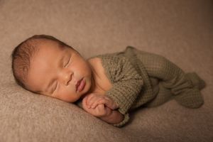 baby boy praying hands newborn session