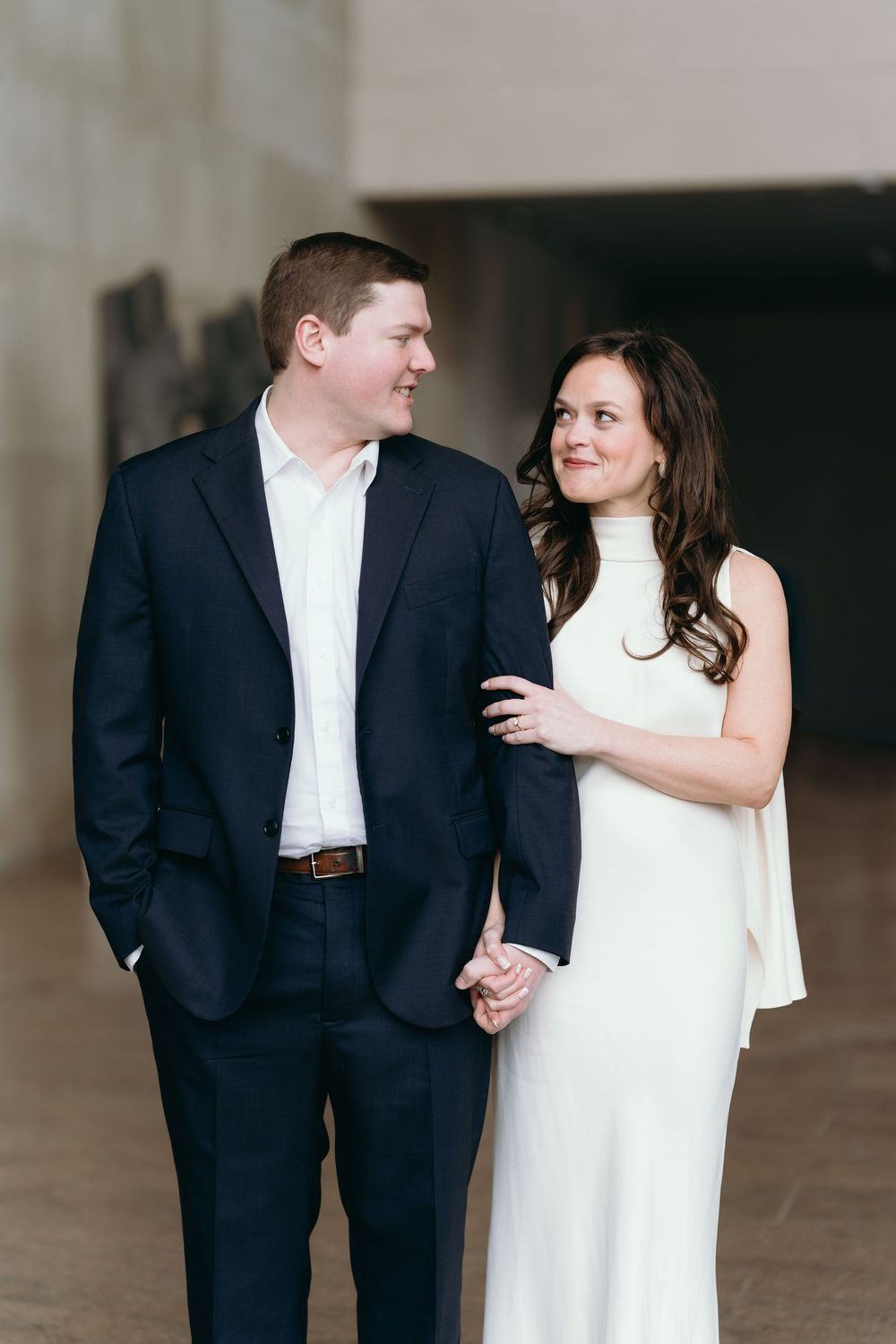 A couple in formal attire shares intimate moments in a series of romantic engagement photos.