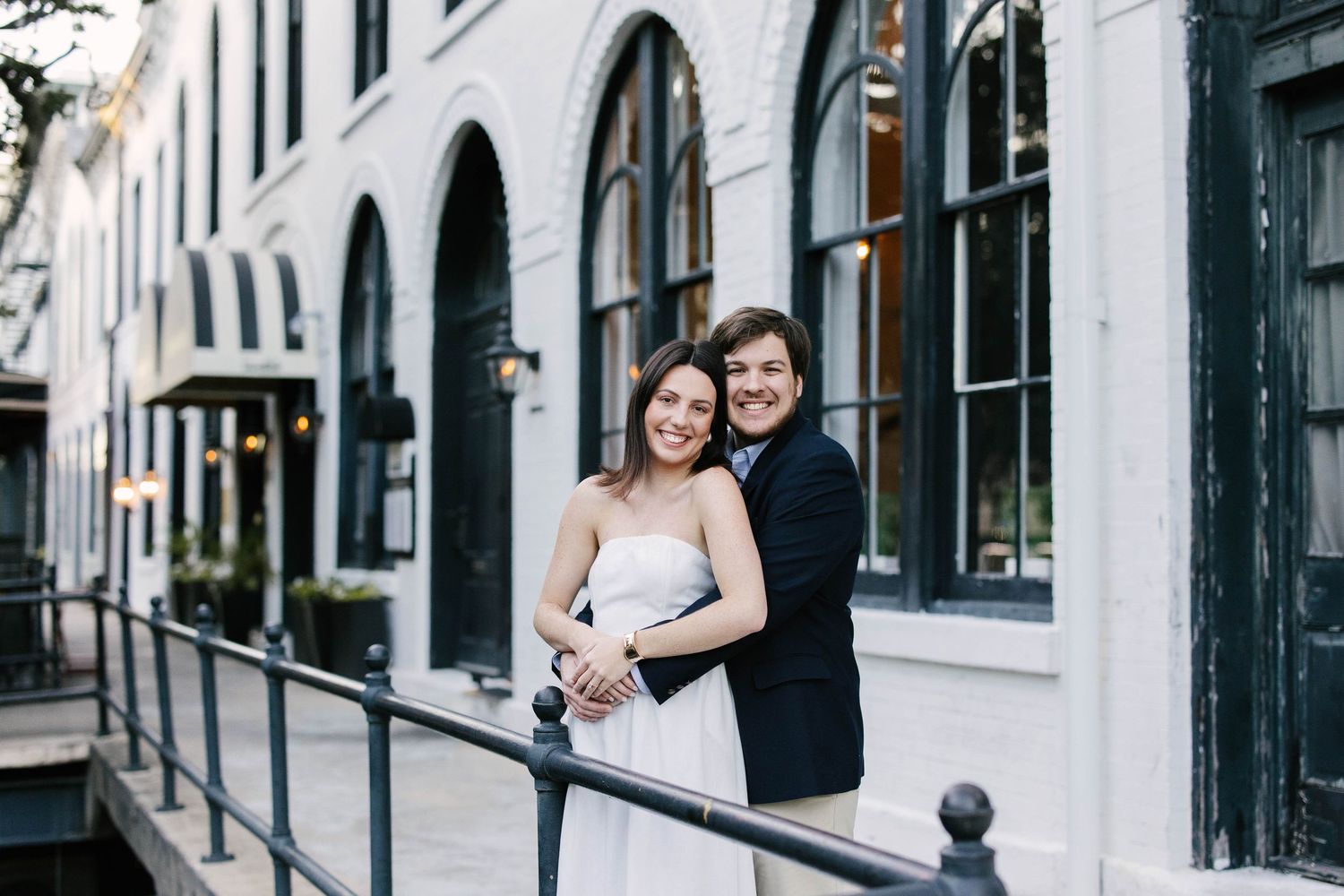 A romantic wedding photo series showing tender moments between a couple in formal attire outdoors.