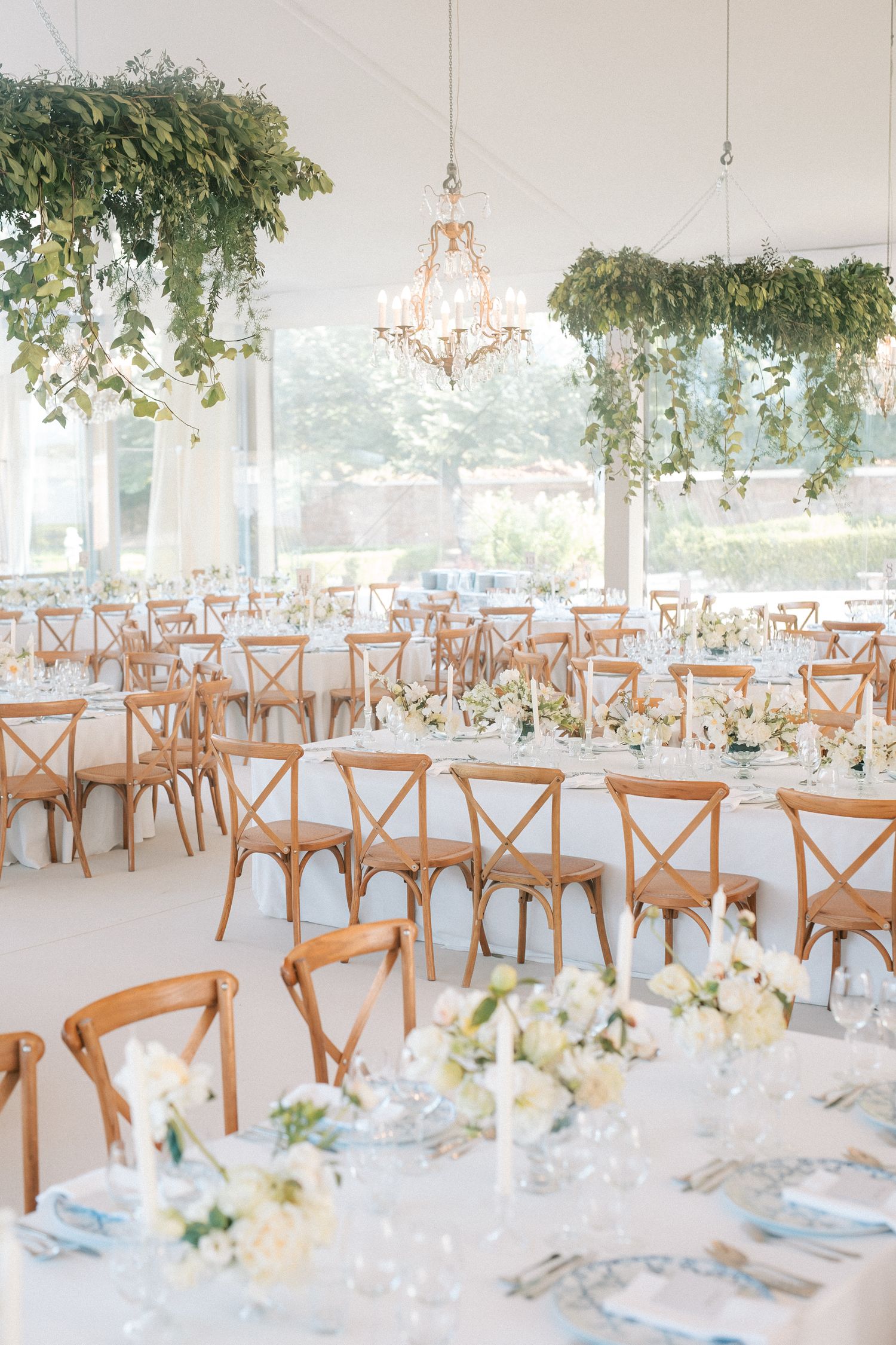Long banquet tables styled for luxury Indian wedding in Portugal