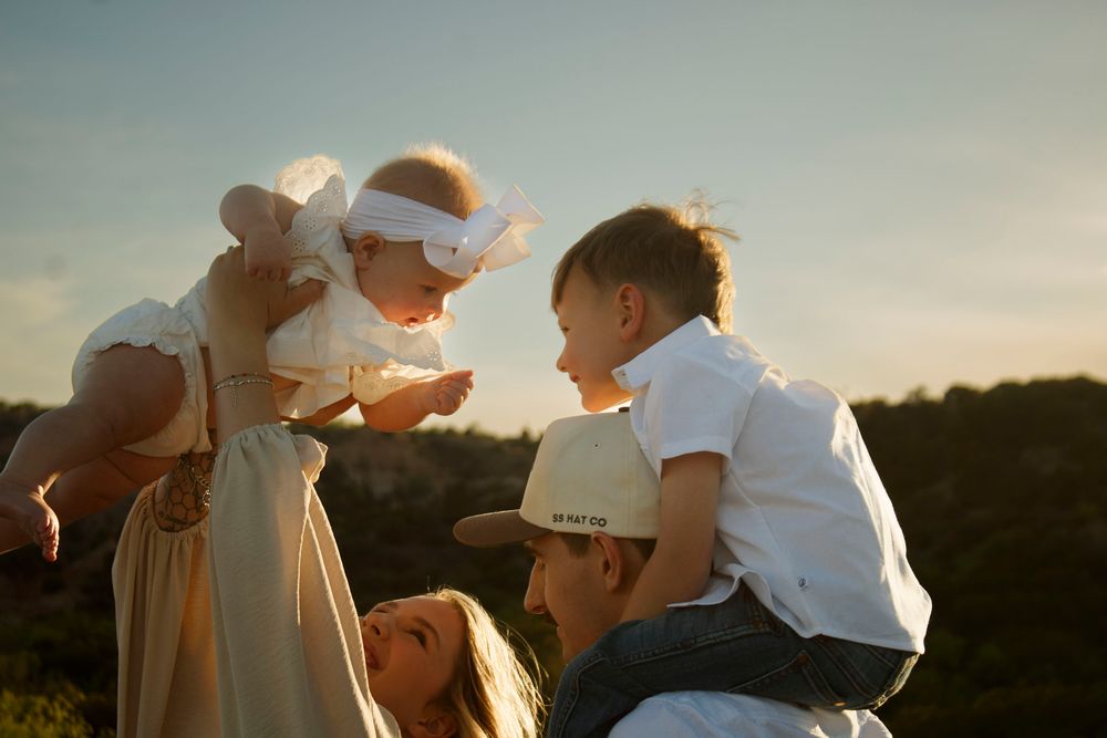 Family of four during a family photo session at Palo Duro Canyon State Park in Canyon, Texas