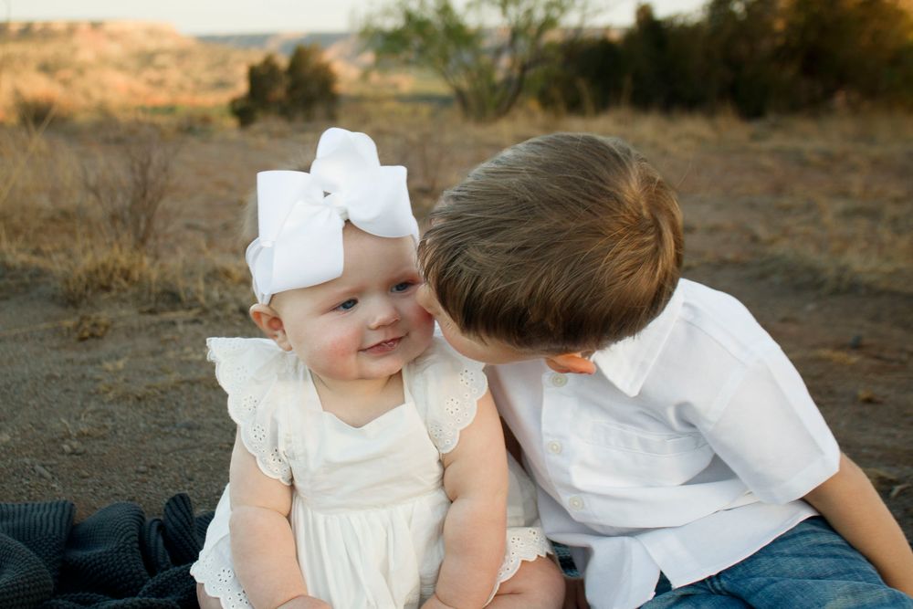 Siblings during a family photo session at Palo Duro Canyon State Park in Canyon, Texas