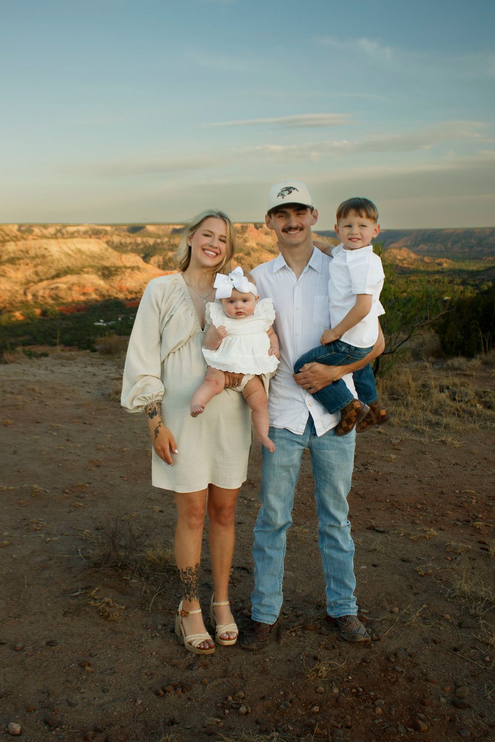 Family of four during a family photo session at Palo Duro Canyon State Park in Canyon, Texas