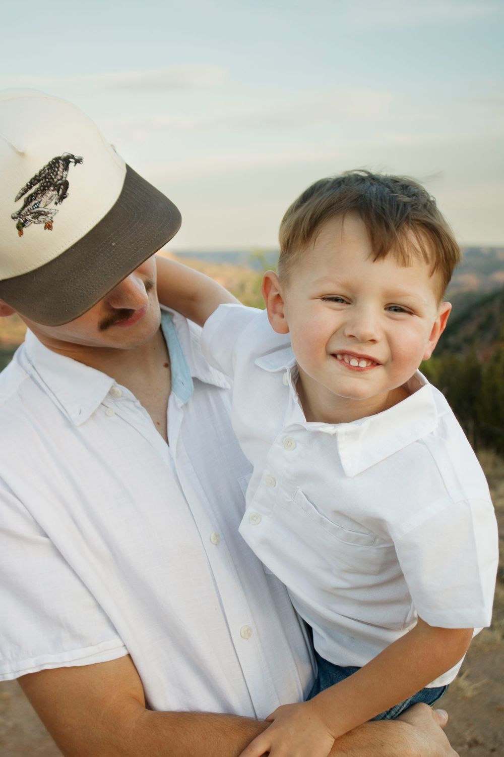 A father and son during a family photo session at Palo Duro Canyon State Park in Canyon, Texas