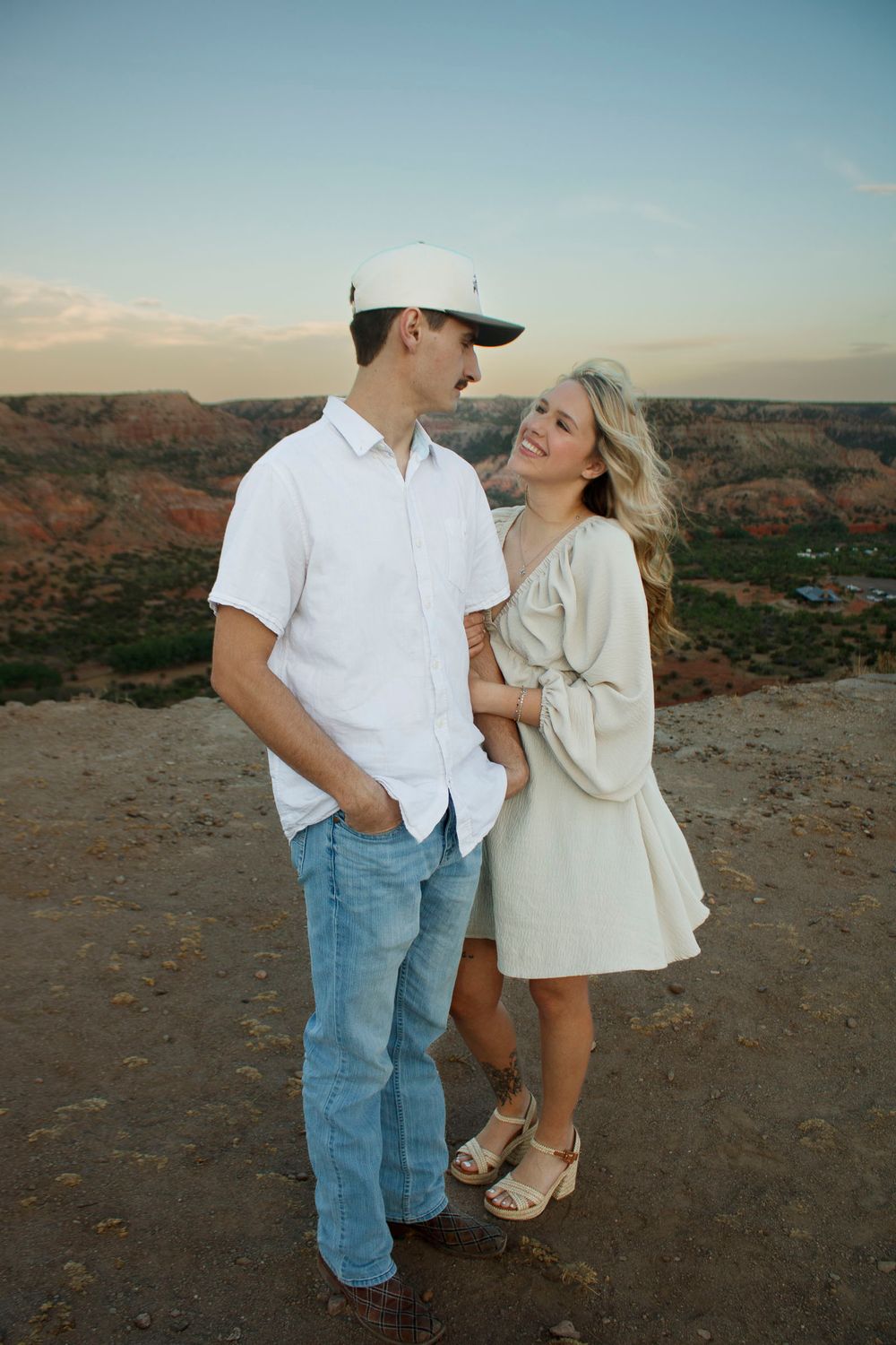 A young couple during family photo session at Palo Duro Canyon State Park in Canyon, Texas