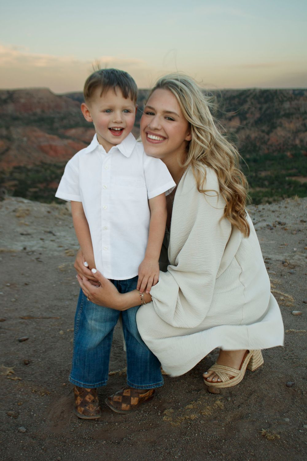 A young mother with her son during a family photo session at Palo Duro Canyon State Park in Canyon, Texas