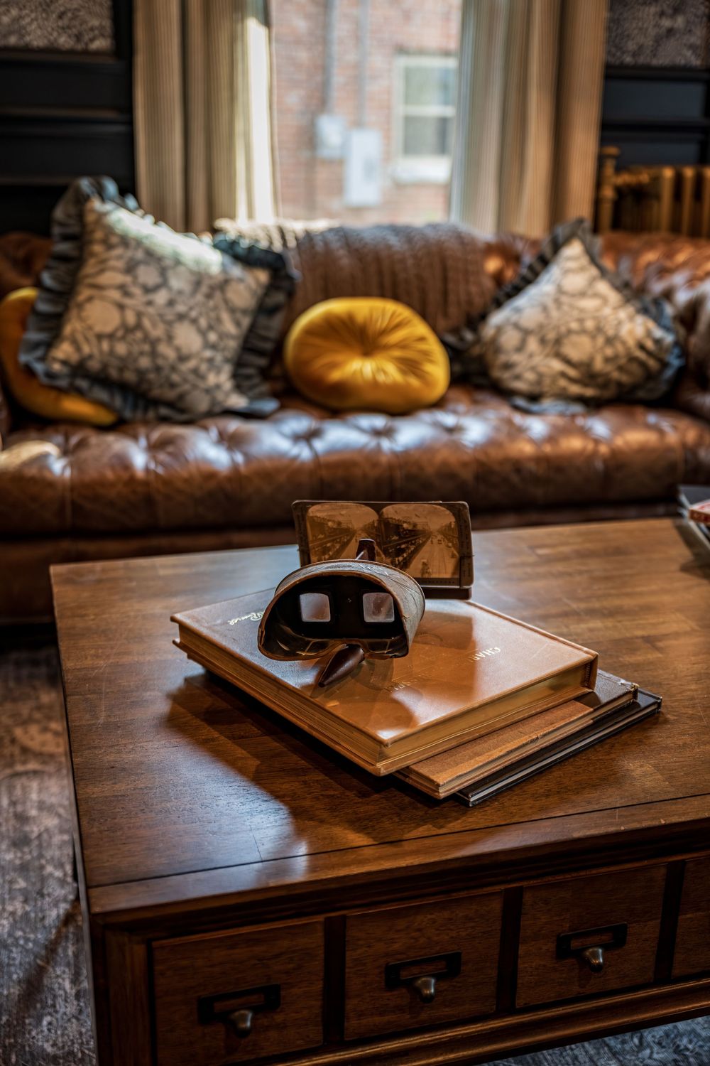Detail shot of a book and old time viewer in the luxury boutique hotel The Dove Inn in Golden, CO.