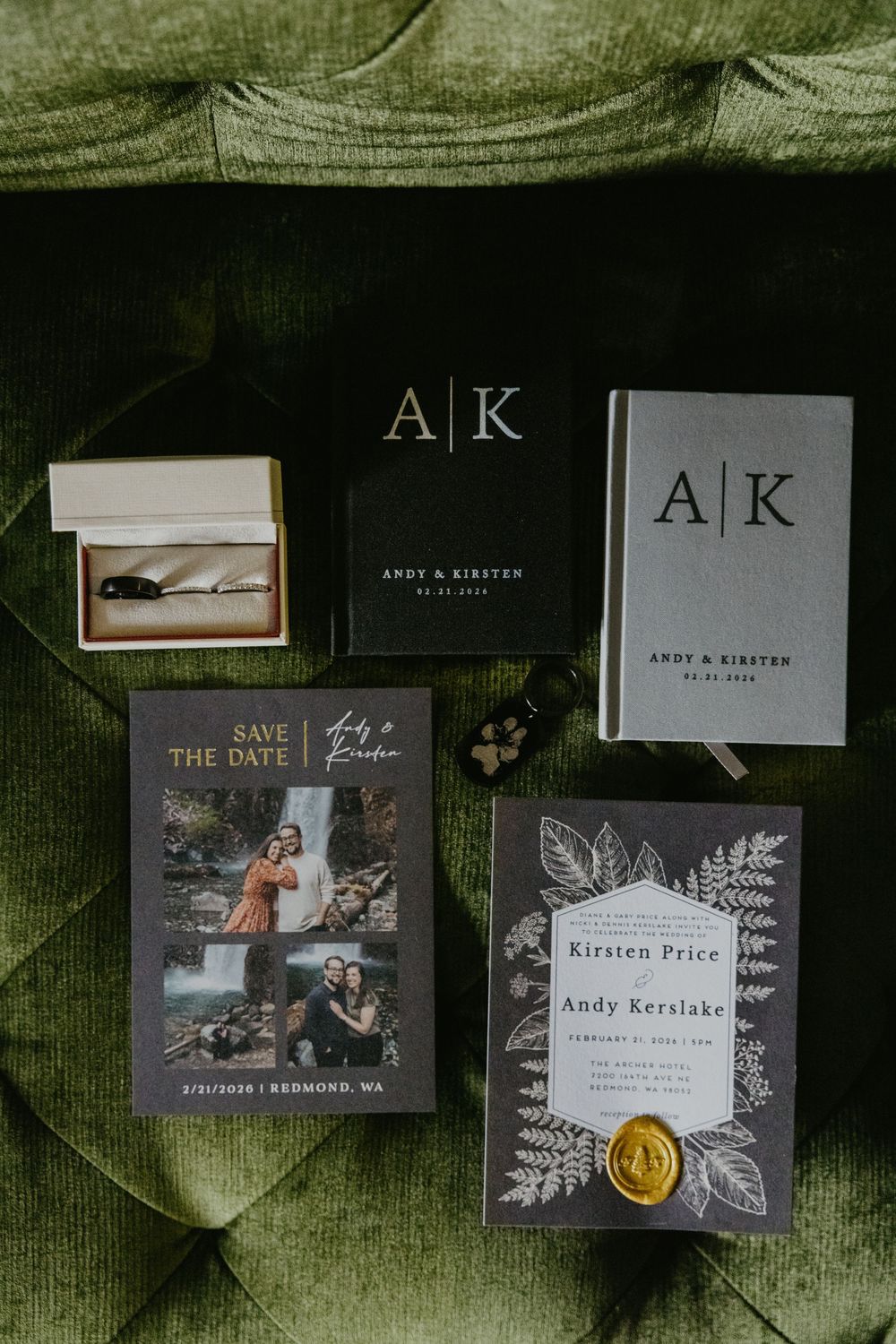 Flat lay of wedding stationery suite for Andy and Kirsten including invitations, save the dates, and monogram items.