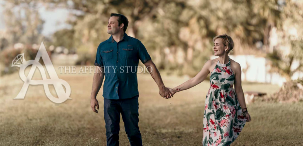 Ian and Franchesca from The Affinity Studio posing together against a white background, photographers serving St Augustine and Jacksonville