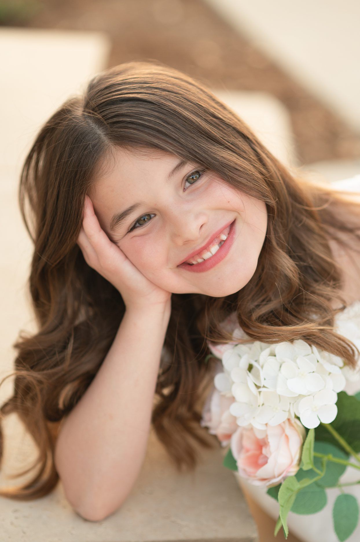 Religious Milestone Baptism portraits for 8 Year old Girl in Downtown Bartlesville at the Conoco Plaza by Bartlesville Photographer Kristi B