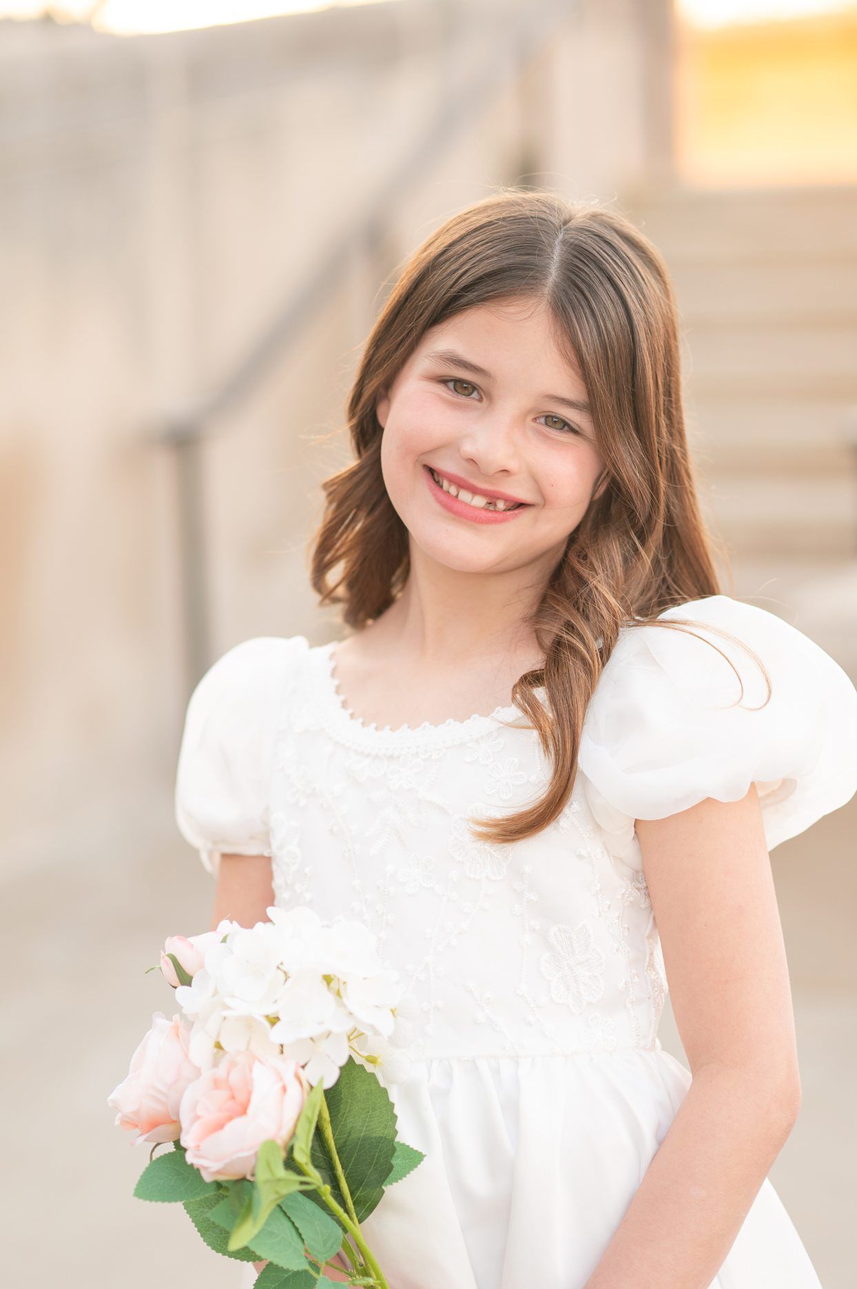 Religious Milestone Baptism portraits for 8 Year old Girl in Downtown Bartlesville at the Conoco Plaza by Bartlesville Photographer Kristi B