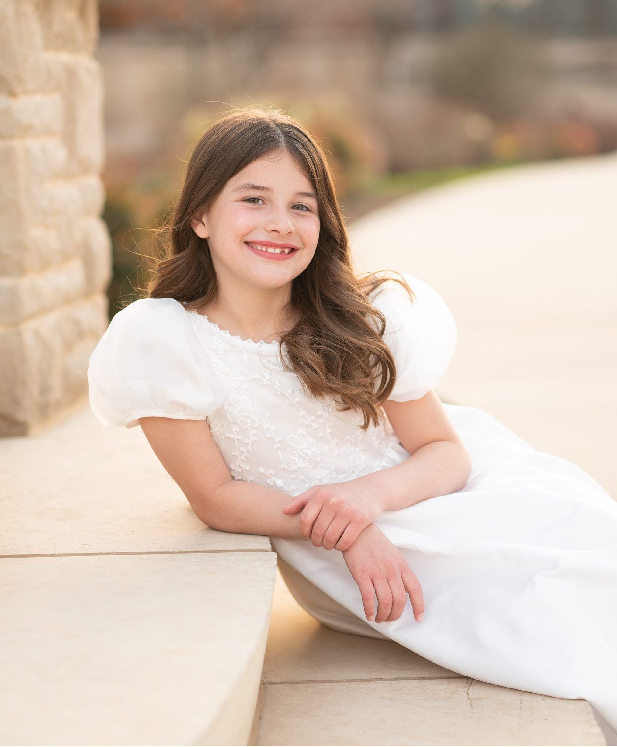 Religious Milestone Baptism portraits for 8 Year old Girl in Downtown Bartlesville at the Conoco Plaza by Bartlesville Photographer Kristi B