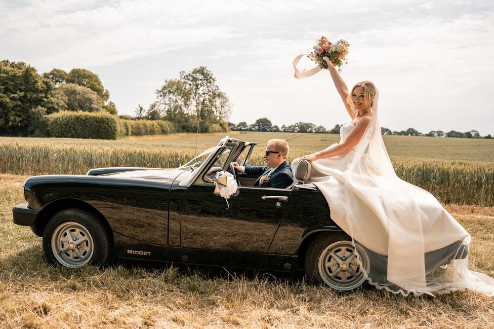 SUFFOLK WEDDING PHOTOGRAPHY - MARQUEE GARDEN WEDDING SUFFOLK - EDITORIAL WEDDING PHOTOGRAPHY VINTAGE CAR SHOT