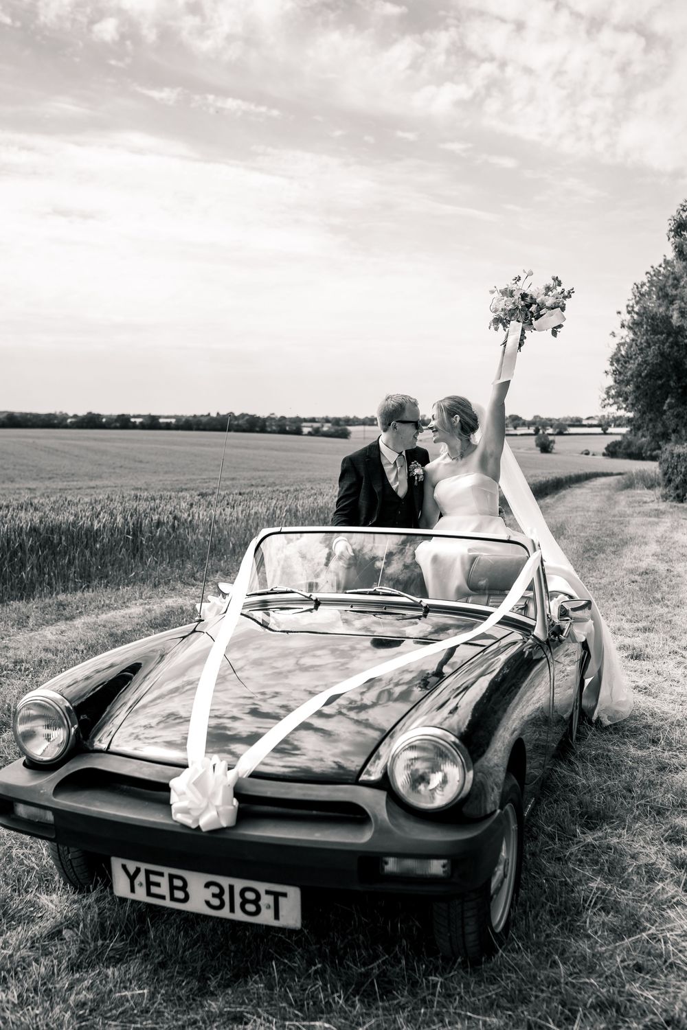 SUFFOLK WEDDING PHOTOGRAPHY - MARQUEE GARDEN WEDDING SUFFOLK - EDITORIAL WEDDING PHOTOGRAPHY VINTAGE CAR SHOT