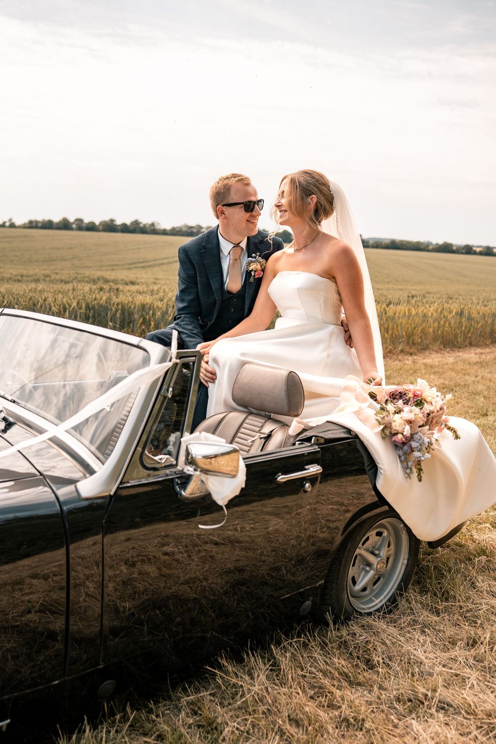 SUFFOLK WEDDING PHOTOGRAPHY - MARQUEE GARDEN WEDDING SUFFOLK - EDITORIAL WEDDING PHOTOGRAPHY VINTAGE CAR SHOT