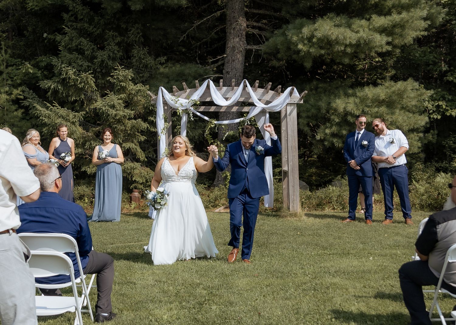 Bride and groom wedding recessional cheering Blueberry Hill Farms, New Brunswick wedding photographer elopement Moncton wedding photos