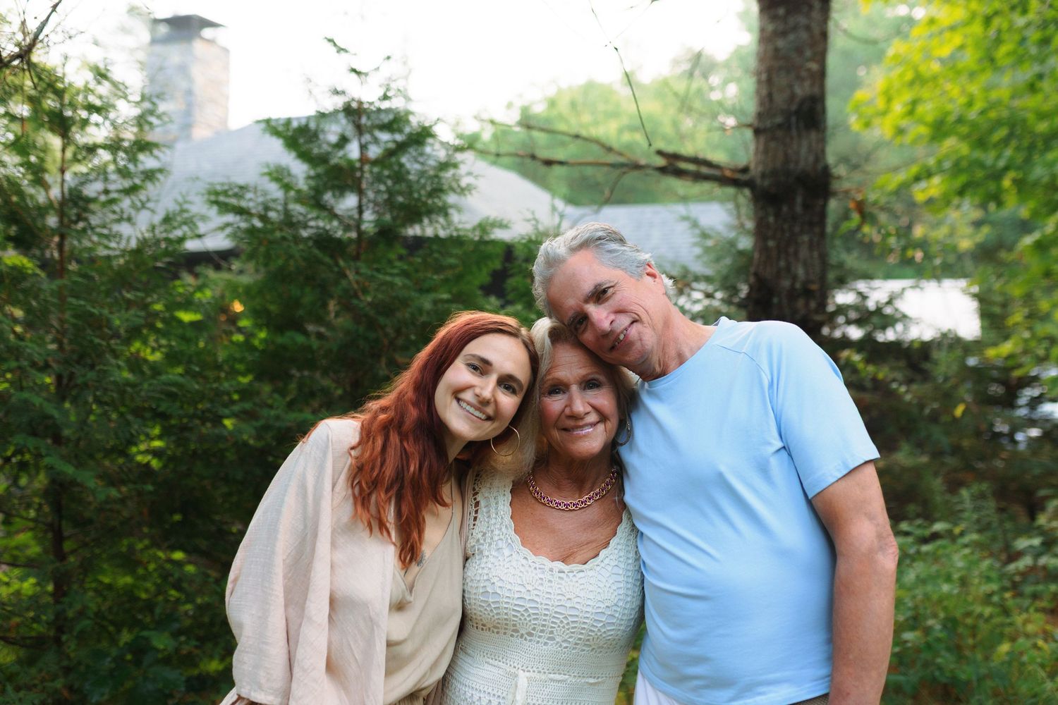 Set of multiple photos showing a couple posing together outdoors in a natural garden setting.