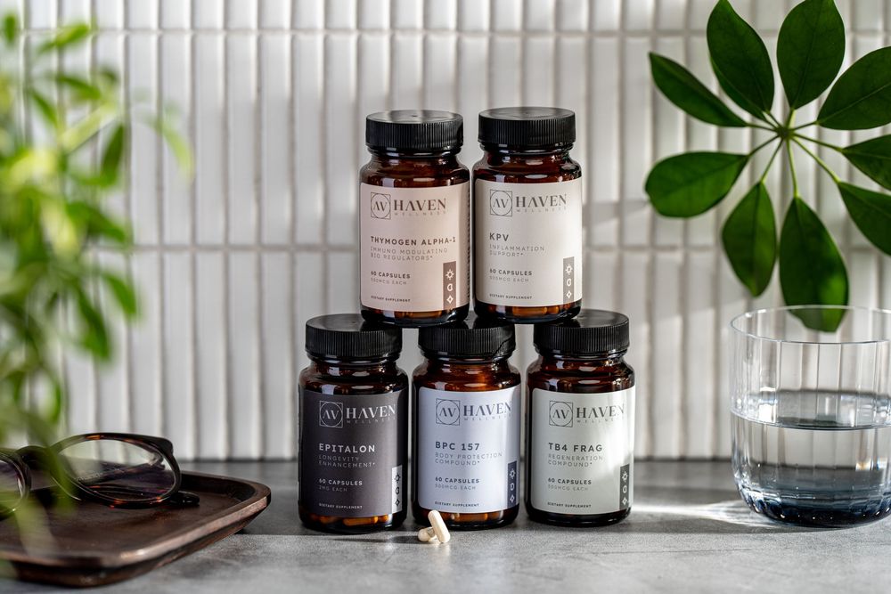 Glass jars of skincare products arranged with green plants and white blinds in natural light creating a minimalist aesthetic.