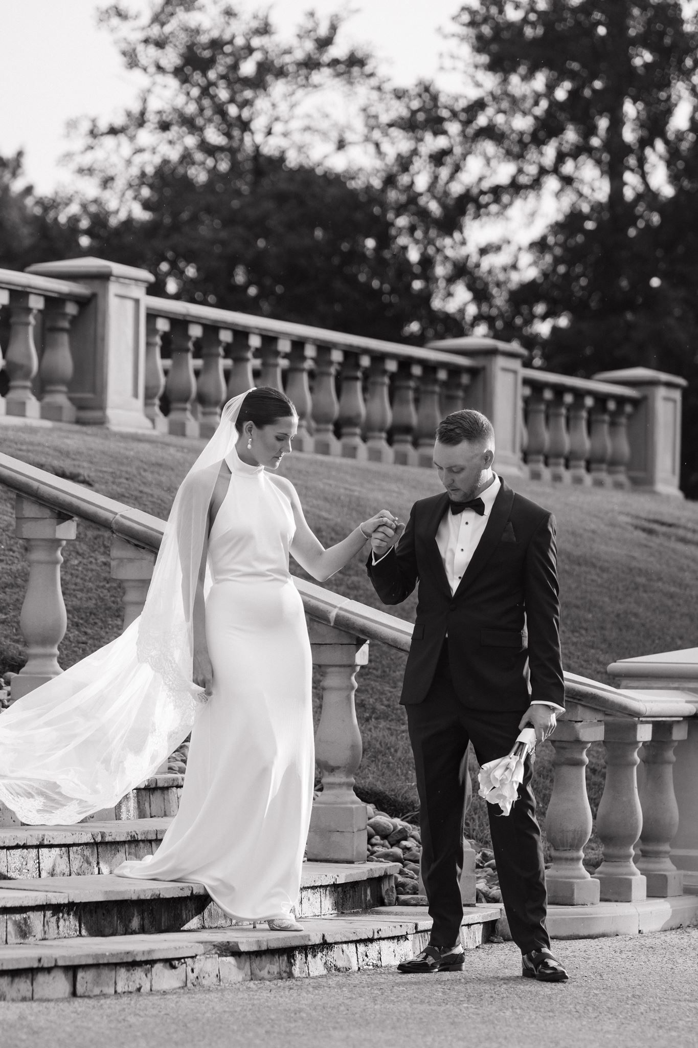 Newlywed couple walking together at the Club at Carlton Woods in The Woodlands, Tx