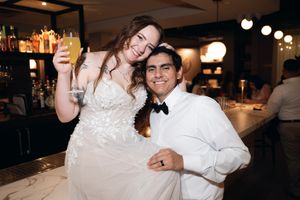 Newlyweds sharing intimate dance moments at their wedding reception.