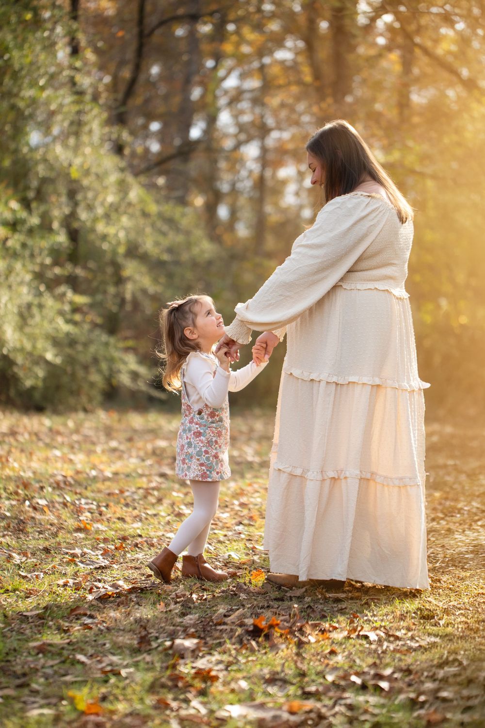 3 year old dances with her mother photographed by Middle Tennessee photographer, Christina Rush