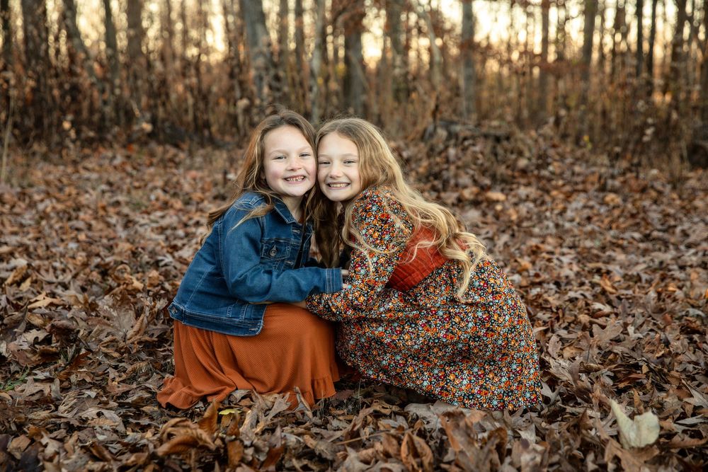 A sister's embrace photographed by Middle Tennessee photographer, Christina Rush