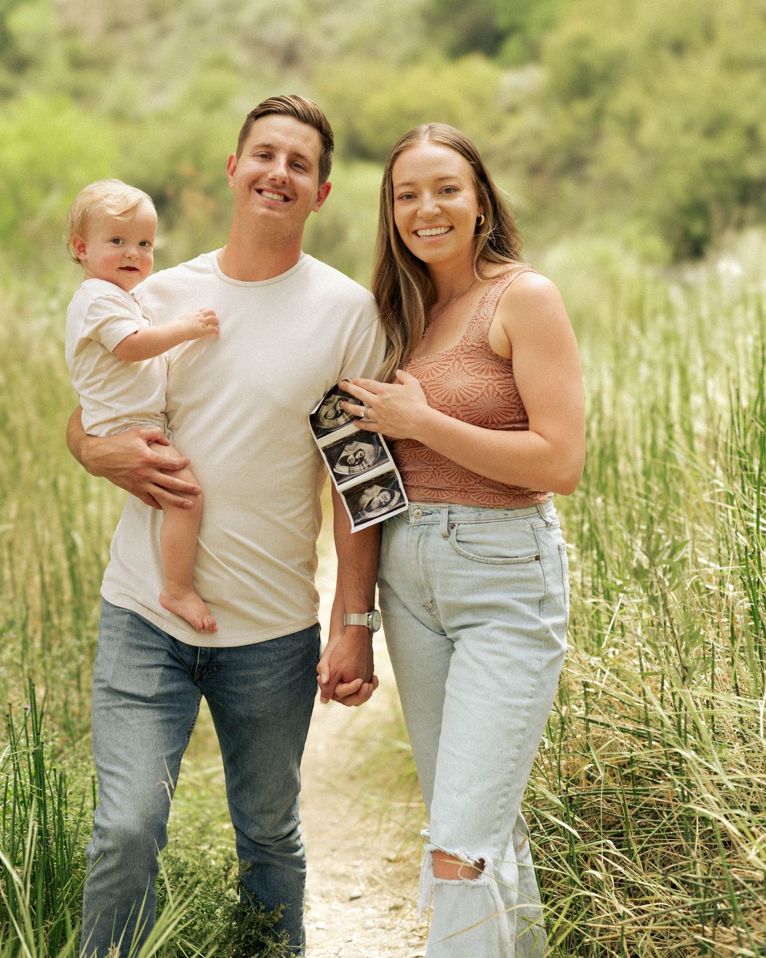 Family photos and baby announcement captured in Reno, Nevada.