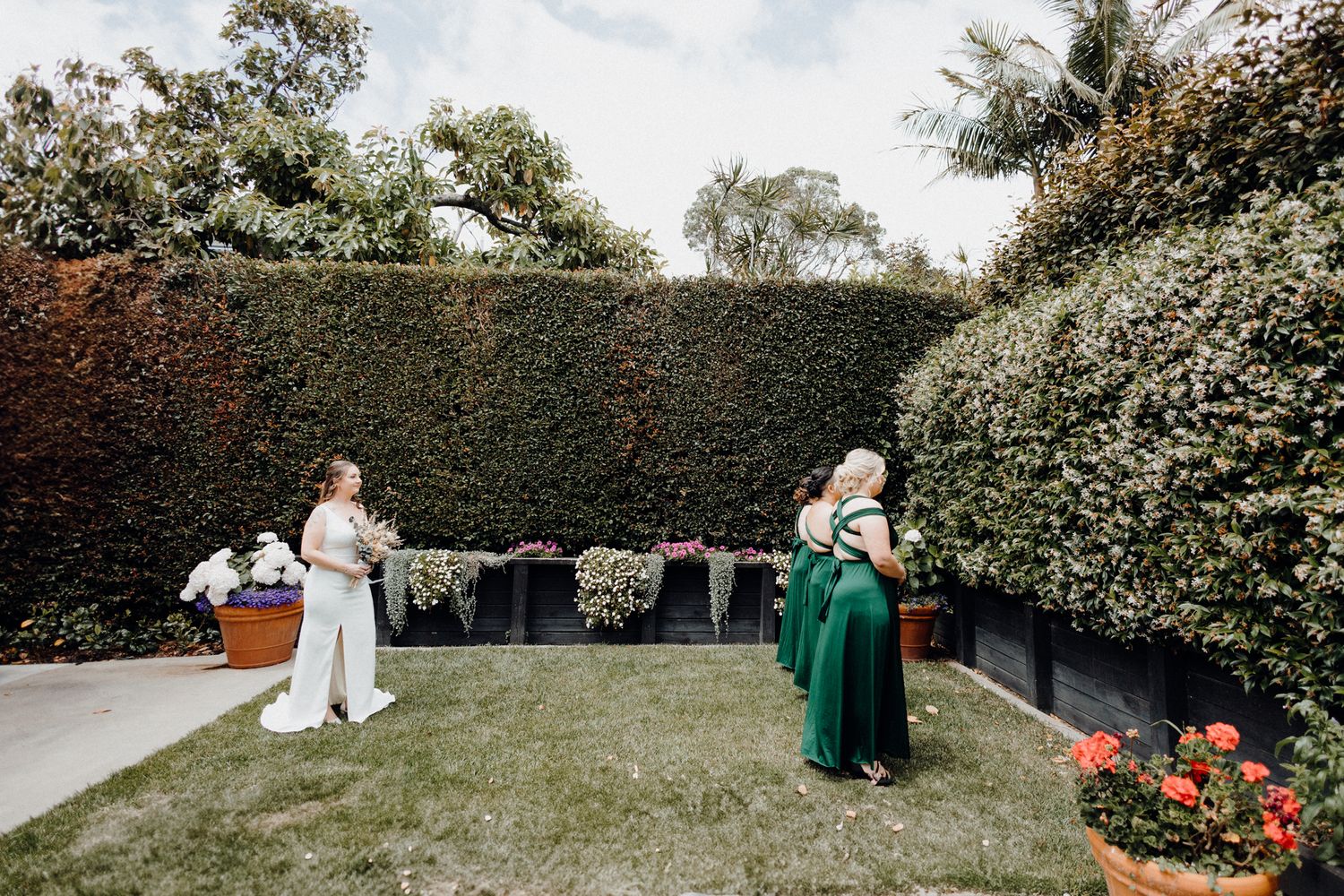 Bride's first Look with Bridesmaid, captured by Apertured Media Auckland Wedding Photographer.