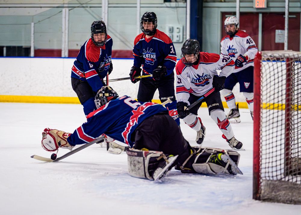 CPIHL All-Star hockey goalie making a save against opposing team, game action at Twin Ponds, Harrisburg PA by SportsFox Photography