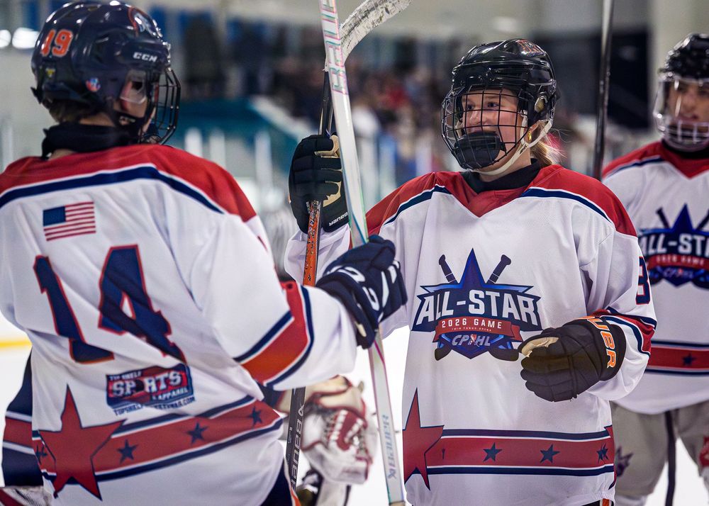 CPIHL All-Star hockey players celebrating goal on ice, team spirit, Twin Ponds, Harrisburg PA by SportsFox Photography