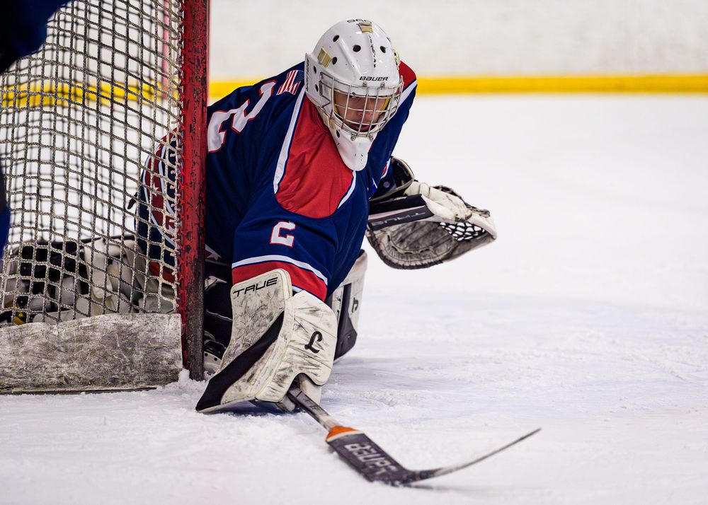 CPIHL All-Star hockey goalie making a save against opposing team, game action at Twin Ponds, Harrisburg PA by SportsFox Photography