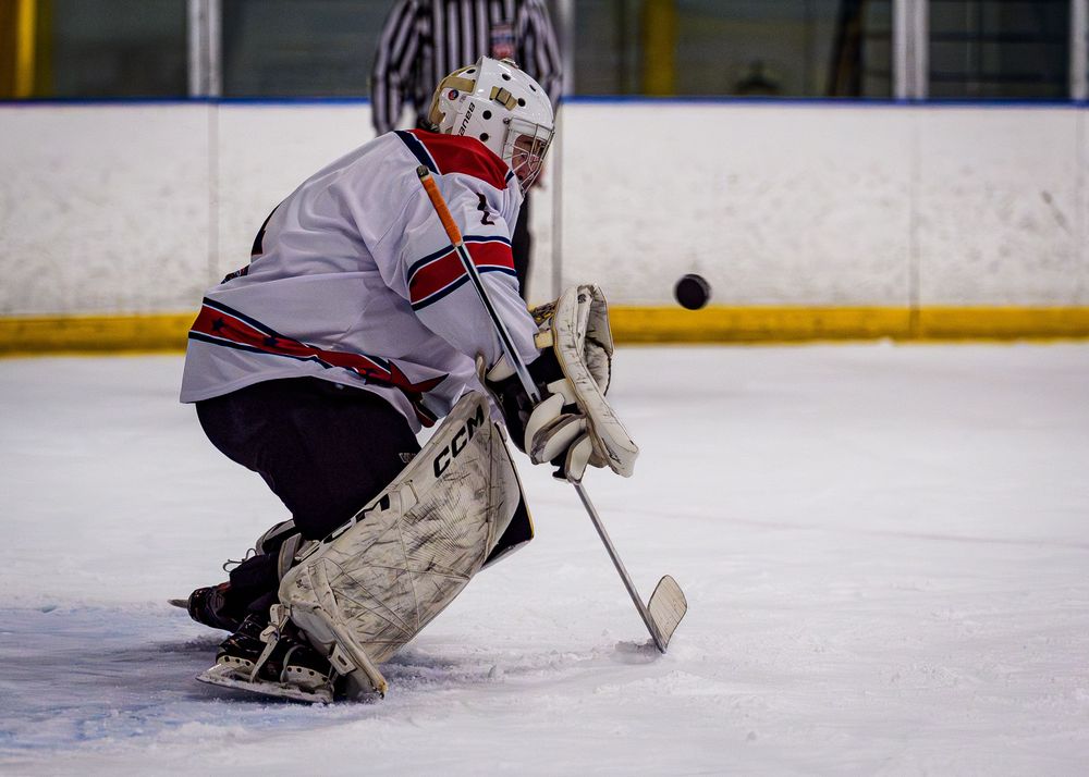 CPIHL All-Star hockey goalie making a save against opposing team, game action at Twin Ponds, Harrisburg PA by SportsFox Photography