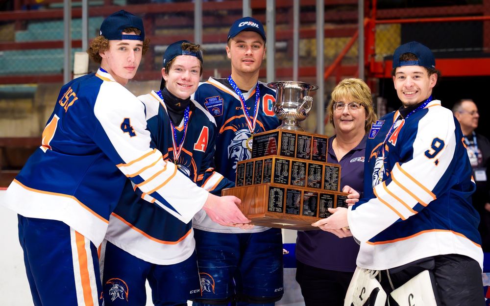 Hershey Trojans captains accepting the Bears Cup trophy, by Deanna Fox, SportsFox Photography, Hershey PA