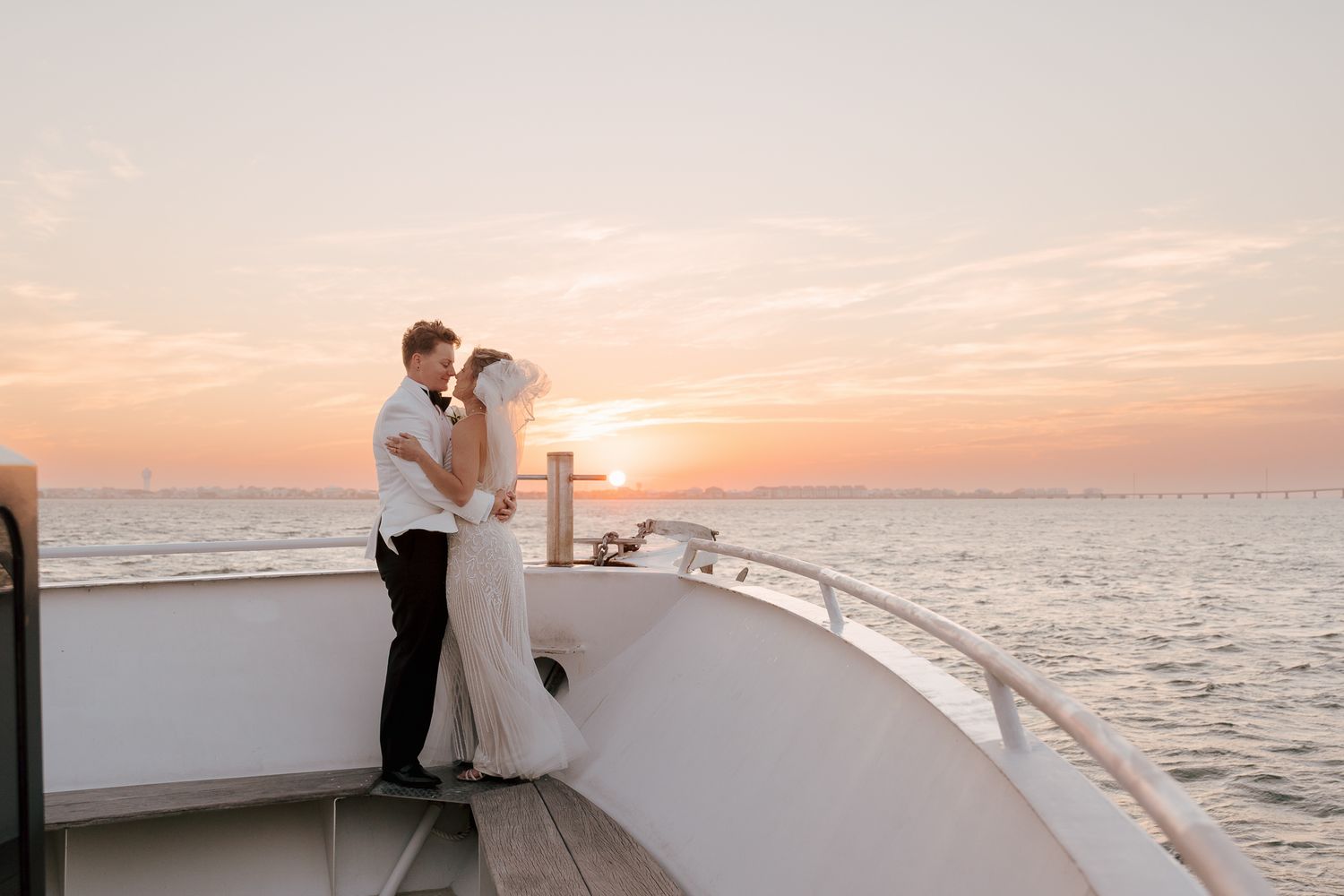 Two Brides during portraits on their wedding day. North Carolina Wedding Photographer