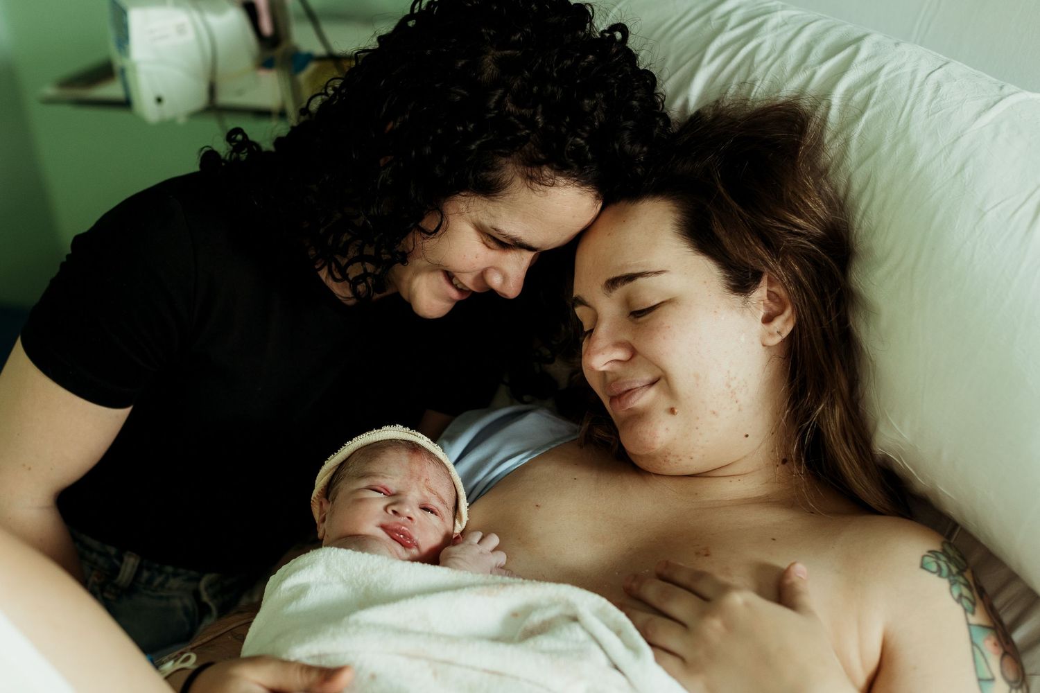 Intimate lifestyle photography capturing quiet moments of rest and connection.