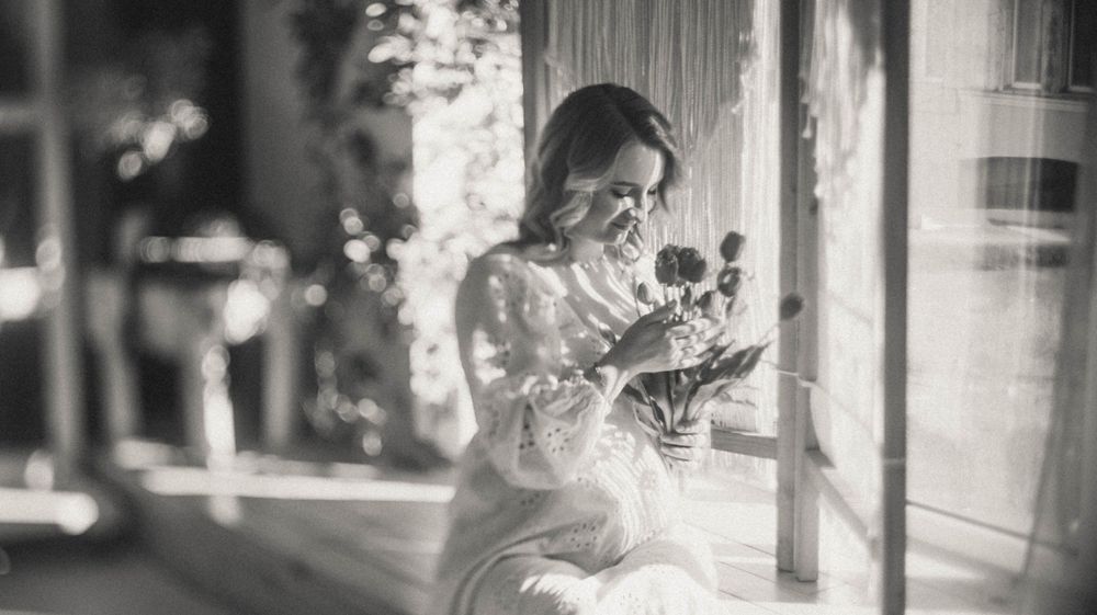 Artistic black and white outdoor photography with natural lighting and shadows.