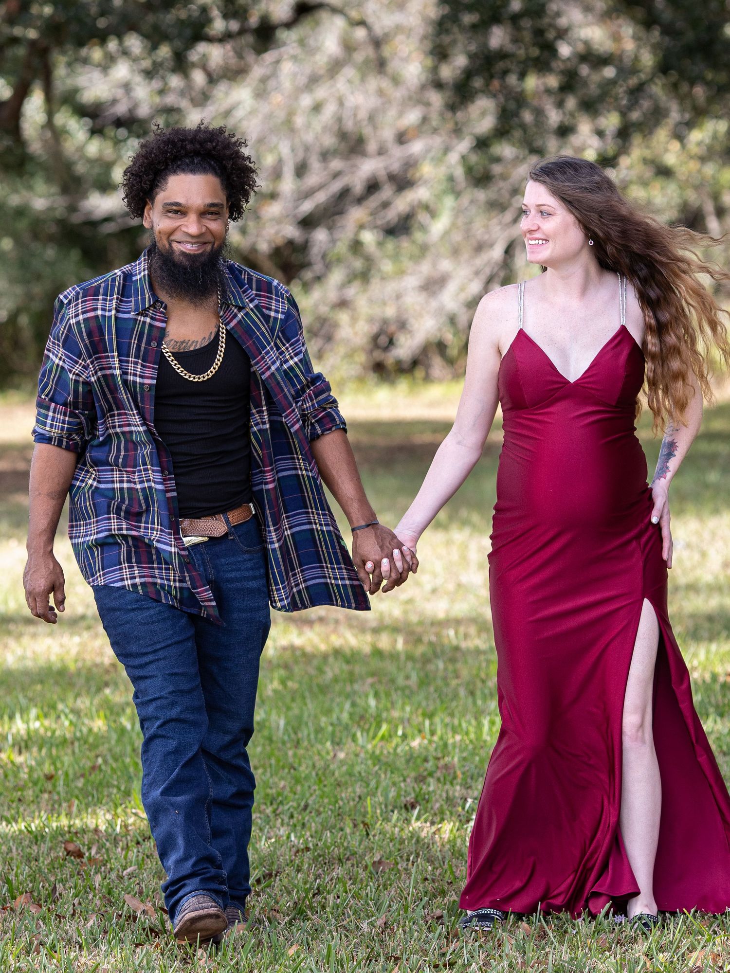A romantic photoshoot sequence showing a couple walking and playing in a grassy outdoor setting.