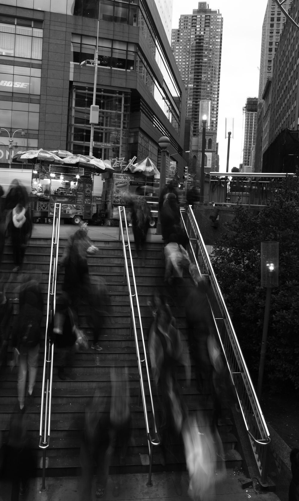 Fine art black and white photograph of hustle and bustle of New York City subway station long exposure city life street photography wall art