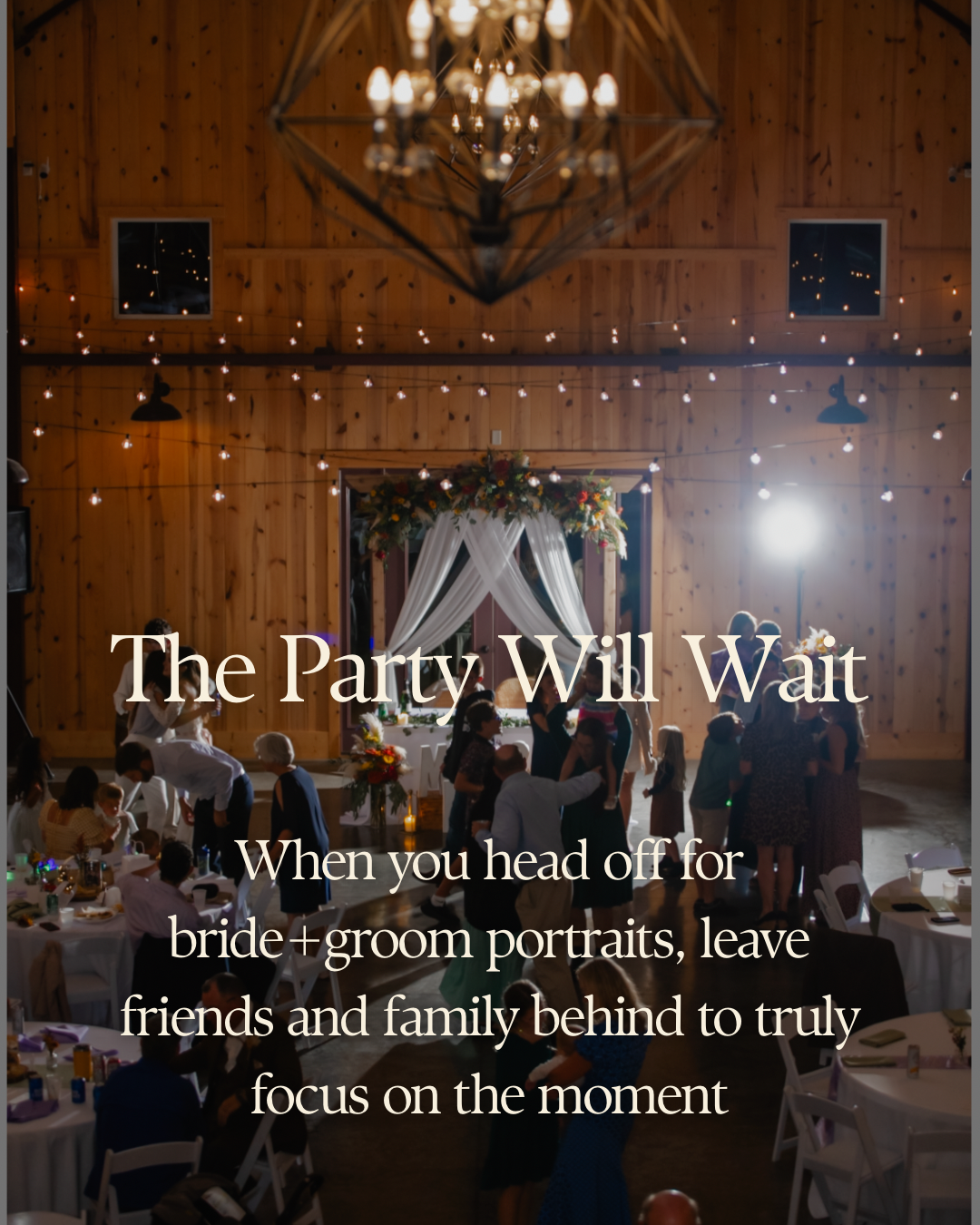 Wedding reception venue features elegant chandeliers and wooden walls illuminated by warm lighting at dusk.