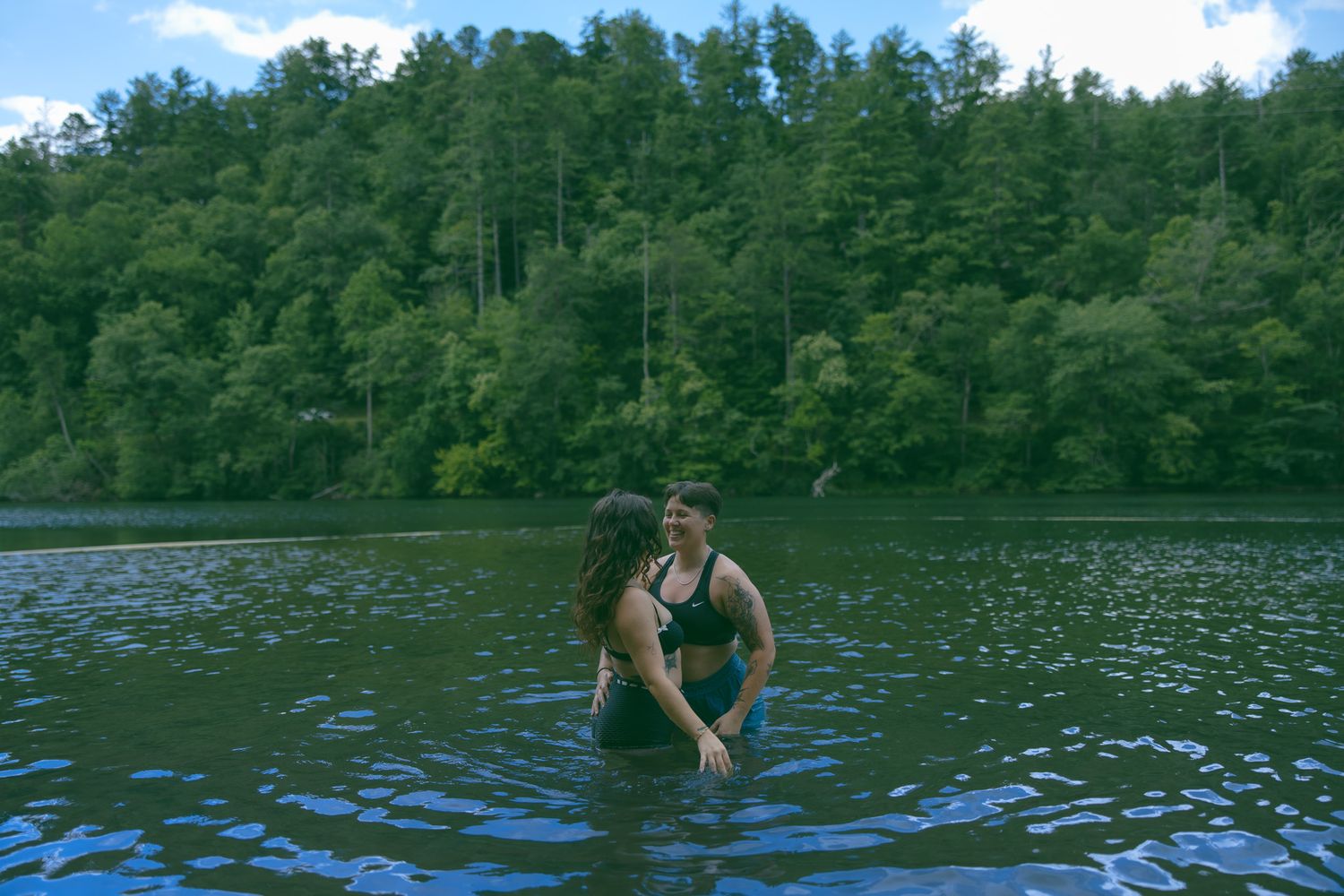two brides wlw sapphic women in lake surrounded by forest for a private and romantic experience