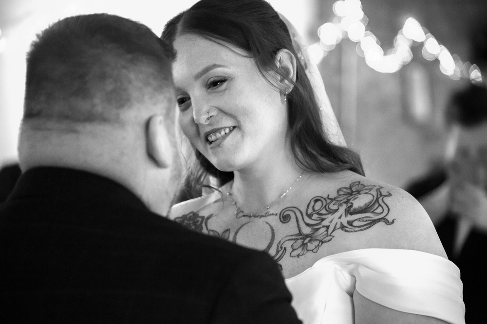 Black and white photo sequence showing tender moments between a couple during their wedding celebration.