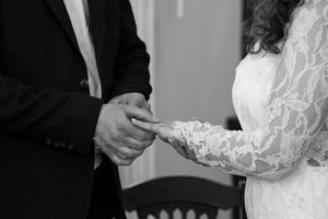 Close-up wedding photography sequence showing tender moments between the couple.