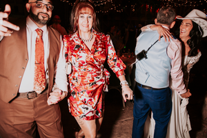 Wedding reception guests dancing and mingling on a lively dance floor. Direct Flash, Over Barn, Gloucester,