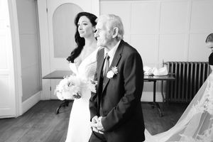 Elegant wedding photos captured in a bright indoor setting with classic decor.Elfordleigh, Plymouth Devon
