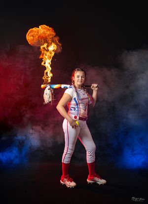 Baseball action poses with fire effects against red and blue smoke background.