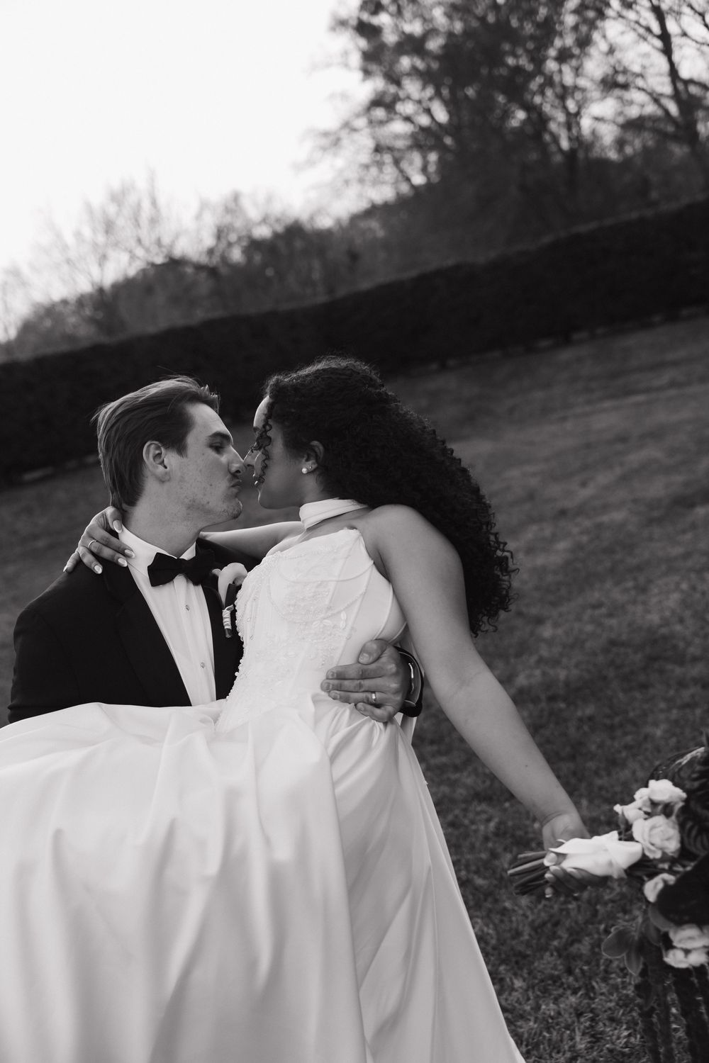 A romantic wedding photo sequence showing a couple dipping and kissing in a grassy outdoor setting.