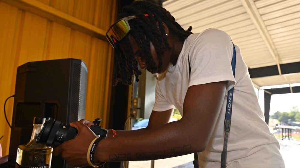 Mills recording an event in Starkville, Ms.