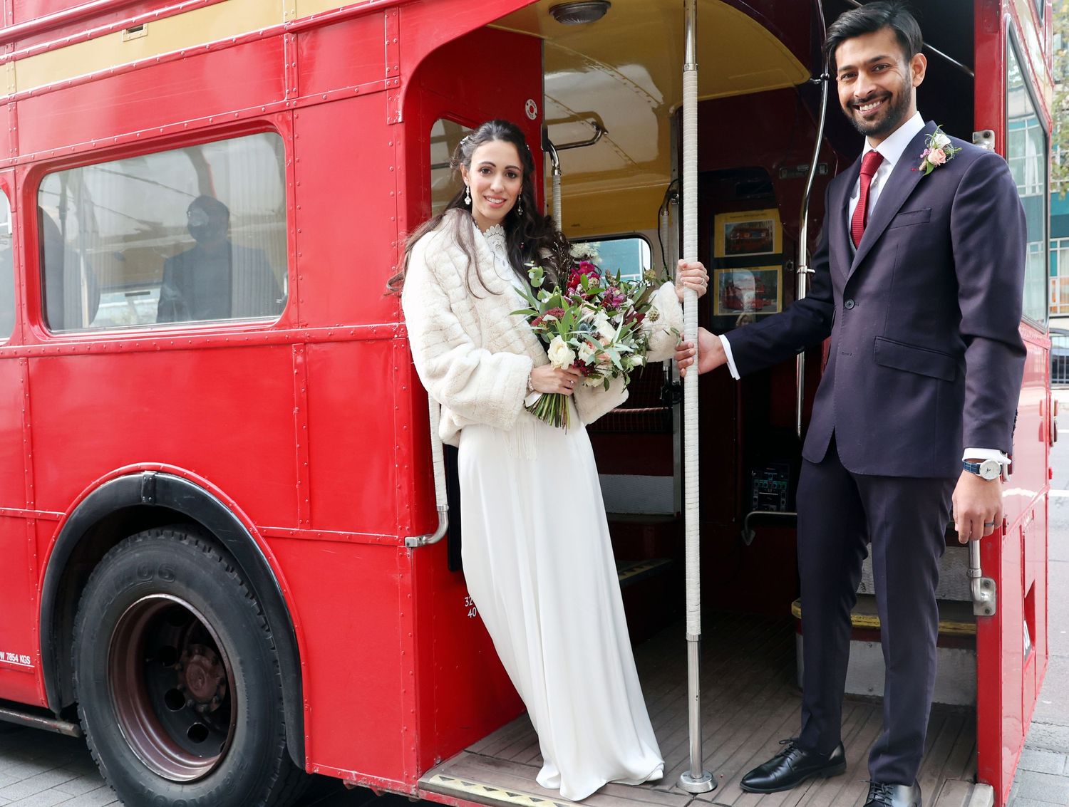 Long hair with loose soft waves and natural makeup for this stunning Italian bride at her London wedding.